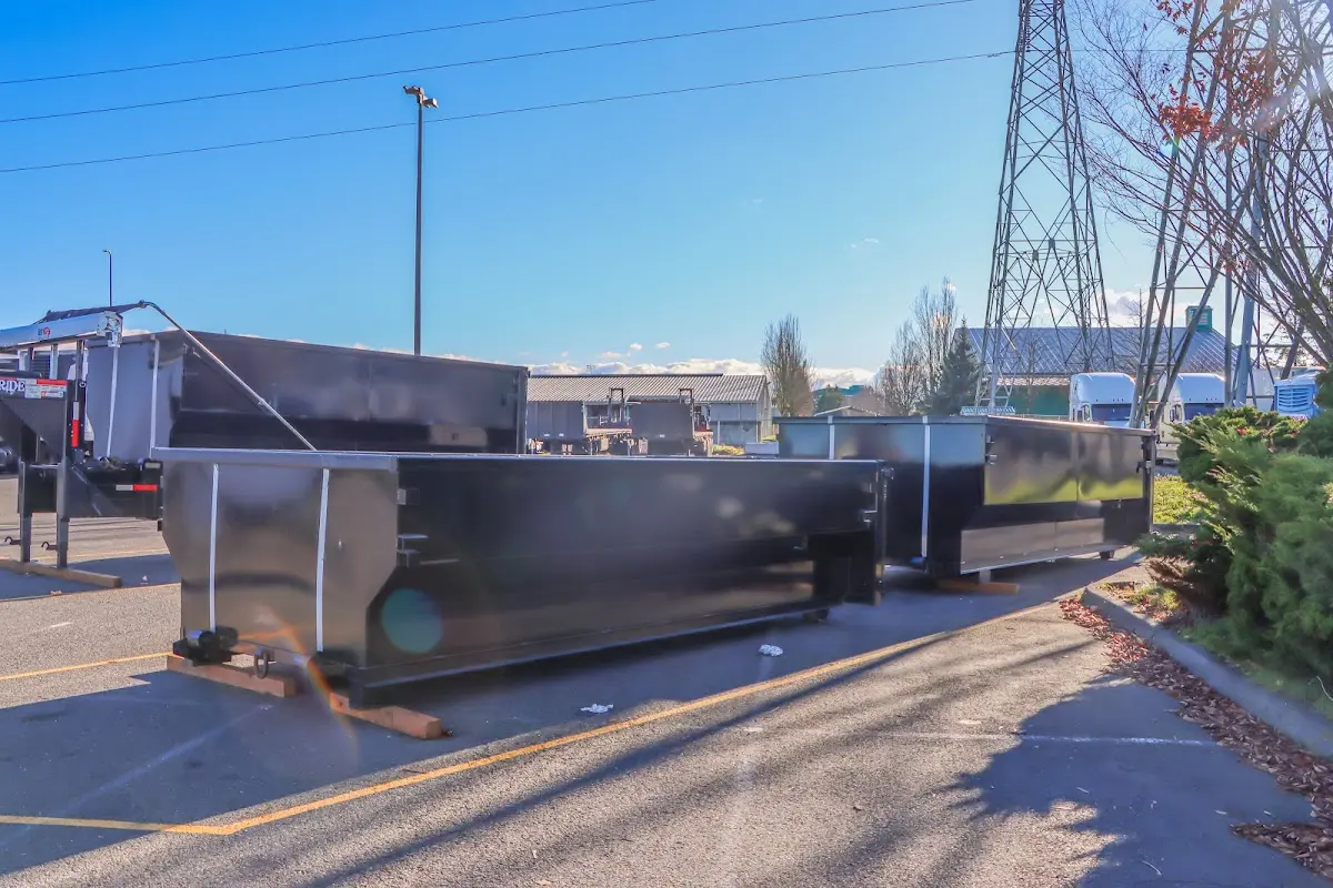Roll-off dumpster ready for waste disposal at job site for 2 Yard Dumpster Rental in Mineola